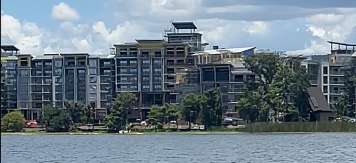 Disney Lakeshore Lodge under active construction on Bay Lake, viewed across the water next to Wilderness Lodge